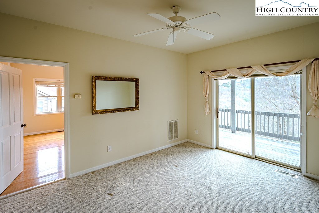 1394 Grandview Drive Extension Boone, NC 28607 - Photo 29 of 44 a view of an empty room with a window