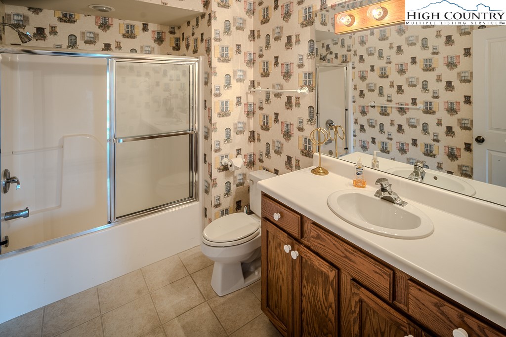 1394 Grandview Drive Extension Boone, NC 28607 - Photo 32 of 44 a bathroom with a sink toilet and shower