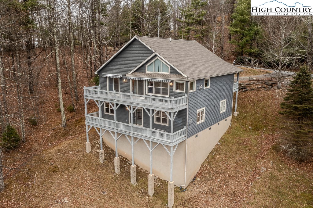 1394 Grandview Drive Extension Boone, NC 28607 - Photo 44 of 44 a aerial view of a house with a yard and balcony
