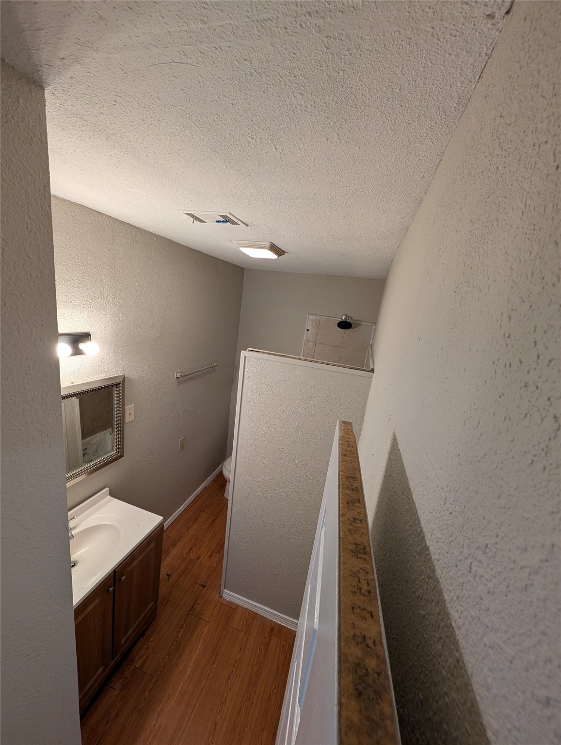 2125 Nora Street Beaumont, TX 77705 - Photo 4 of 13 a view of a kitchen with furniture and wooden floor