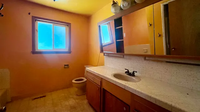 a bathroom with a sink and a bathtub