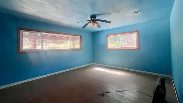 an empty room with windows