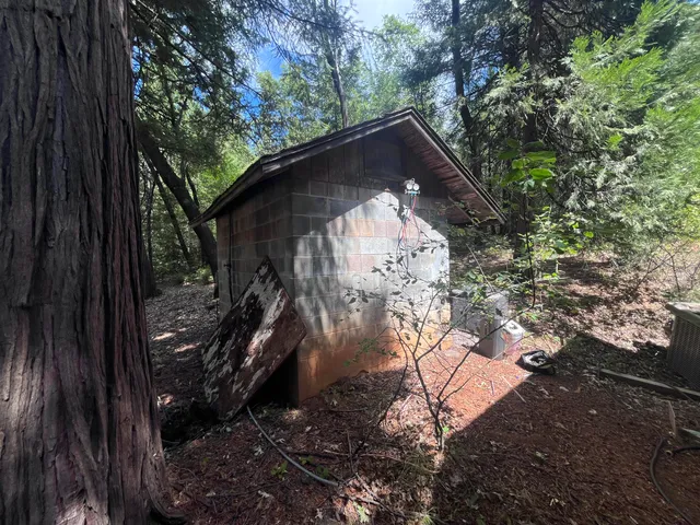 a backyard of a house with seating space
