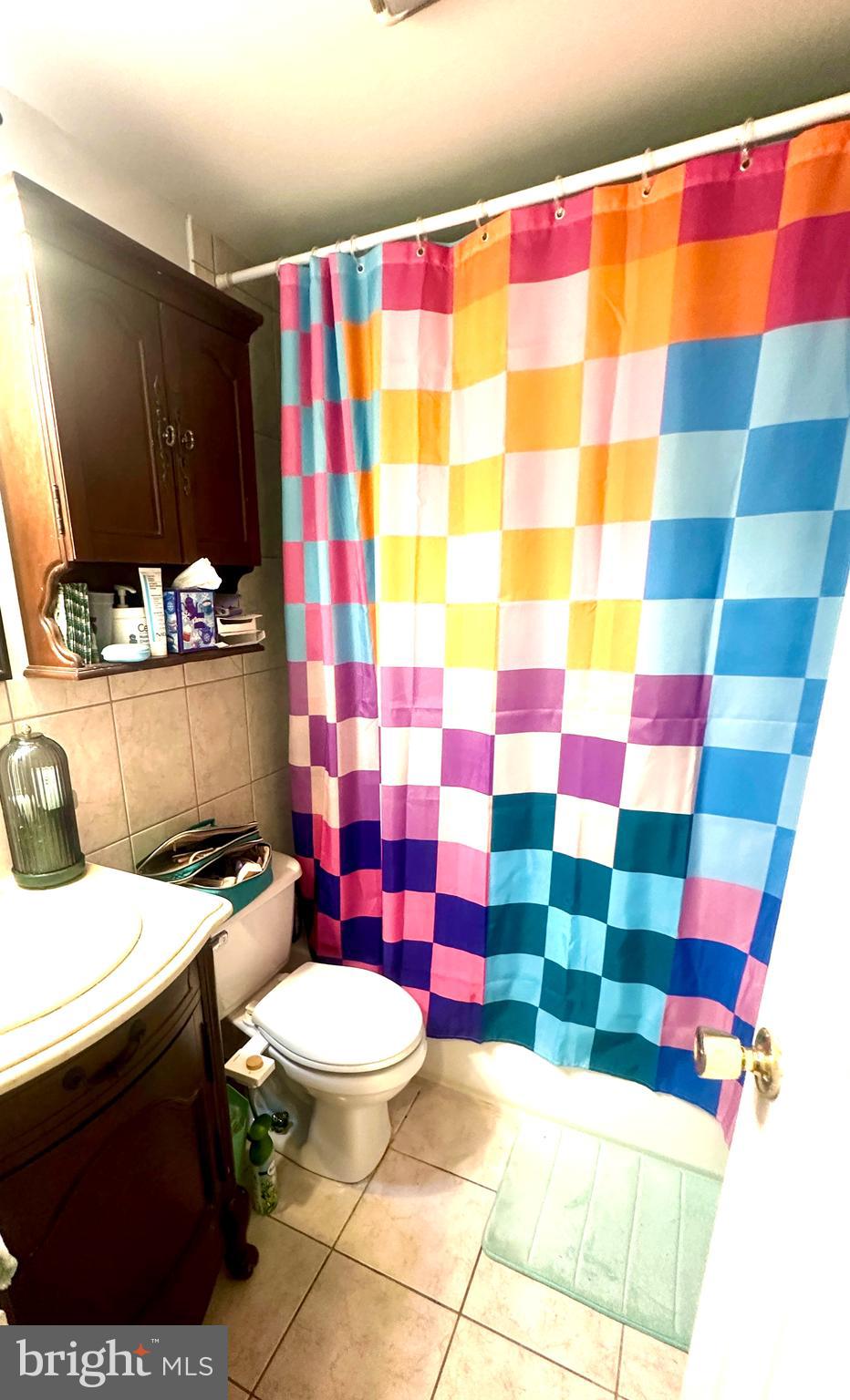 2101 Chestnut Street, Unit 317 Philadelphia, PA 19103 - Photo 29 of 39 a bathroom with a sink toilet and shower