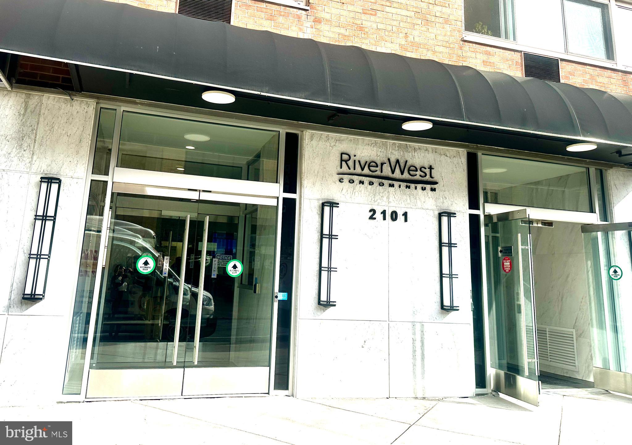 2101 Chestnut Street, Unit 317 Philadelphia, PA 19103 - Photo 4 of 39 a view of a glass door with a glass door