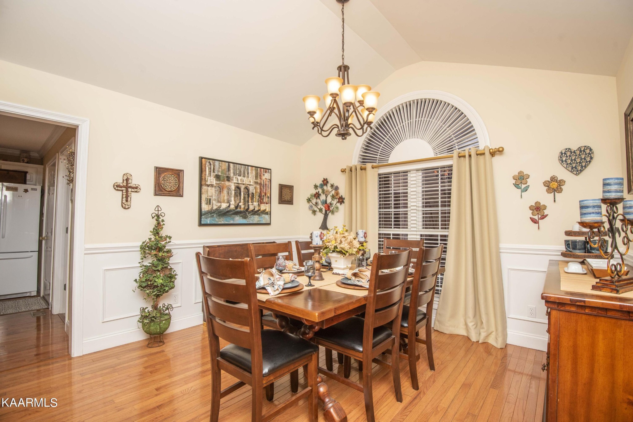 7412 Ridge Haven Court Corryton, TN 37721 - Photo 13 of 59 a view of a dining room with furniture wooden floor and chandelier