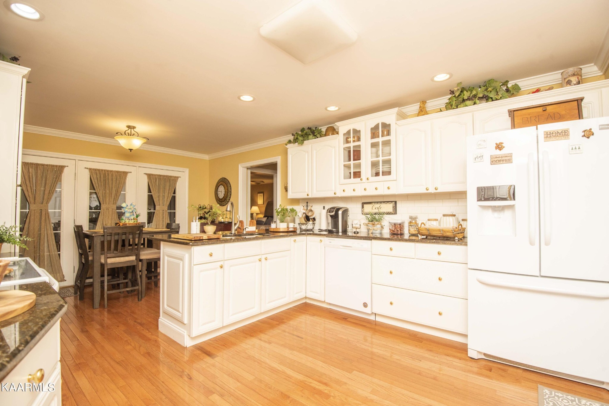 7412 Ridge Haven Court Corryton, TN 37721 - Photo 16 of 59 a kitchen with stainless steel appliances granite countertop a stove and a refrigerator