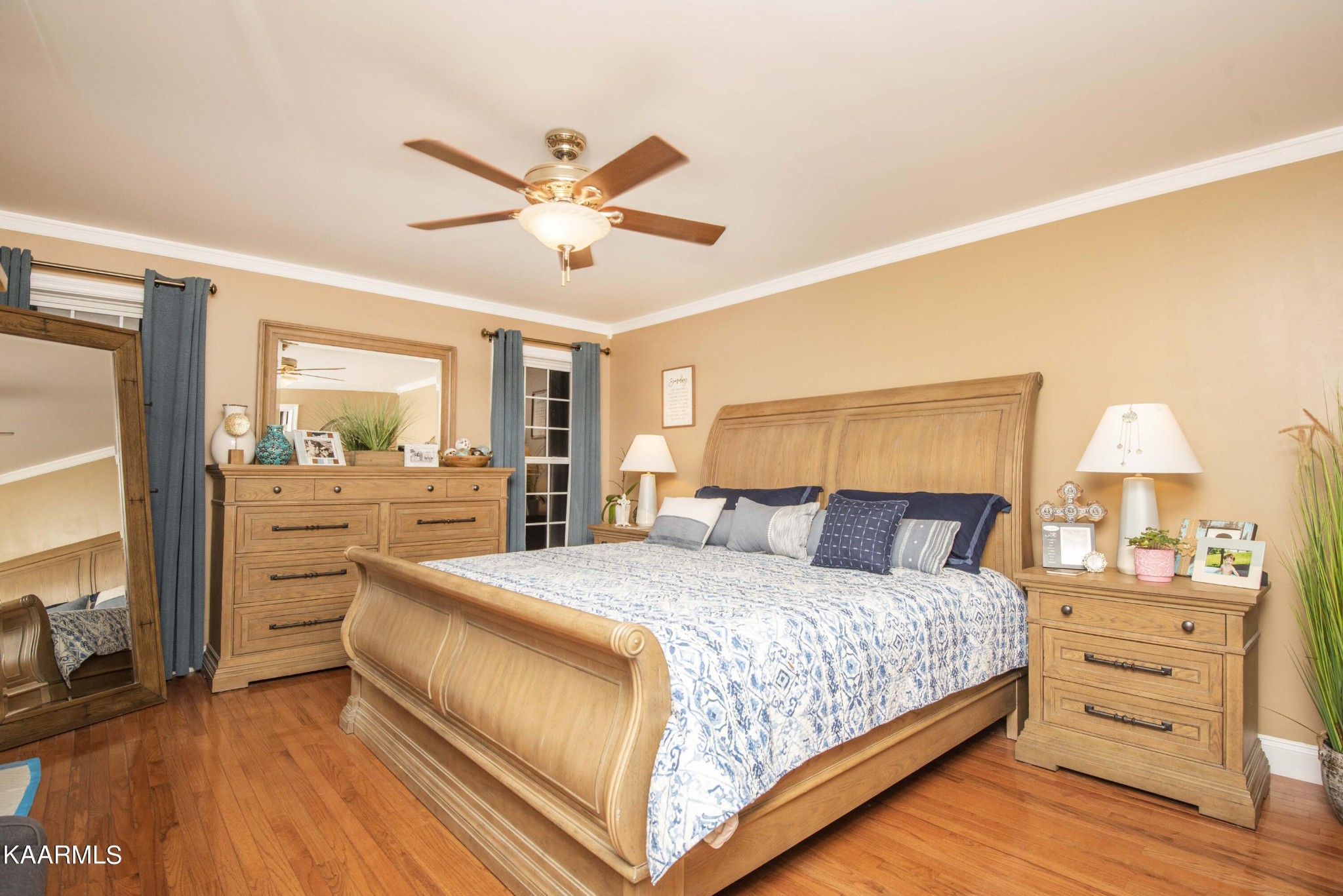 7412 Ridge Haven Court Corryton, TN 37721 - Photo 22 of 59 a bedroom with a large bed and a large window