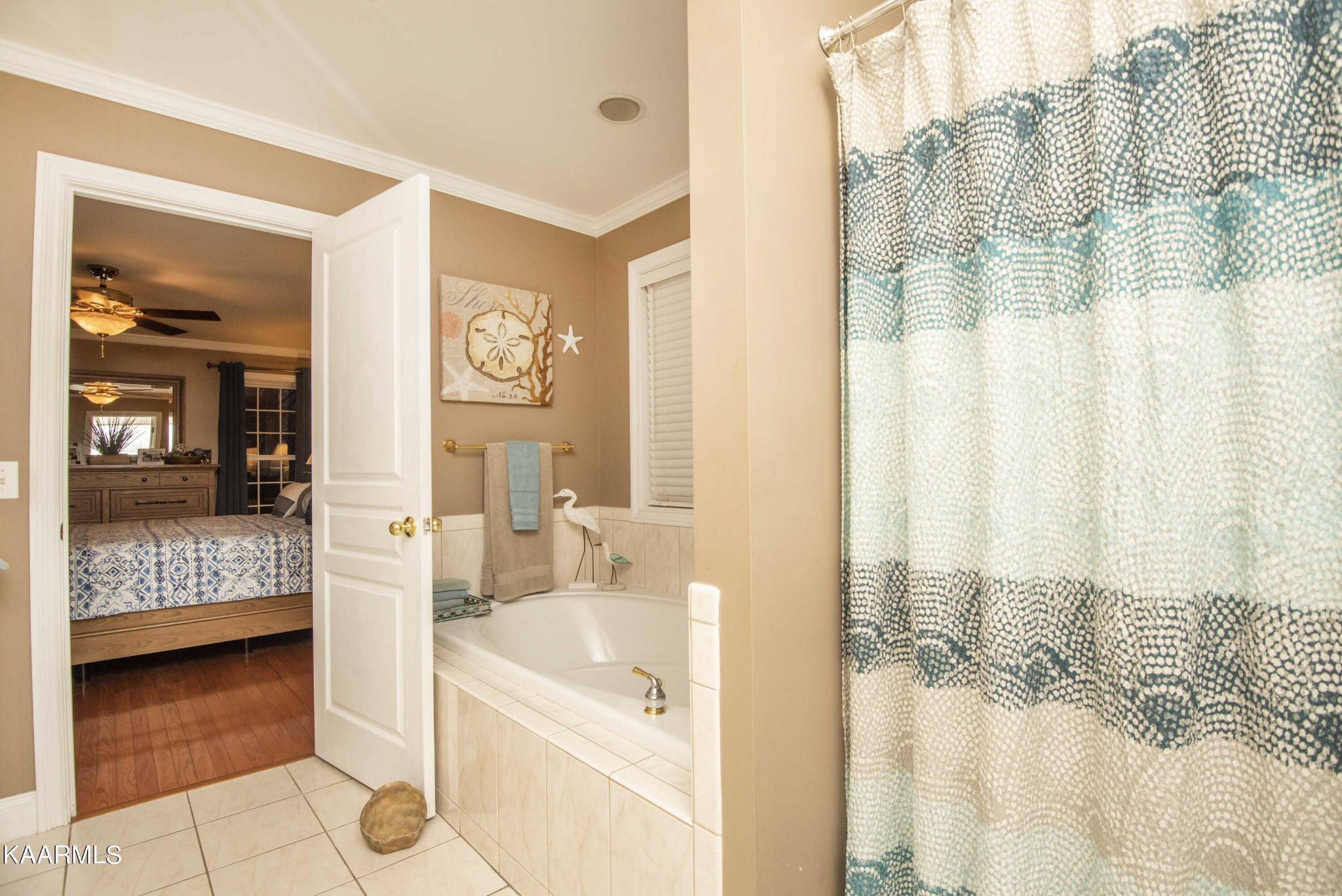 7412 Ridge Haven Court Corryton, TN 37721 - Photo 26 of 59 a spacious bathroom with a tub shower and a sink