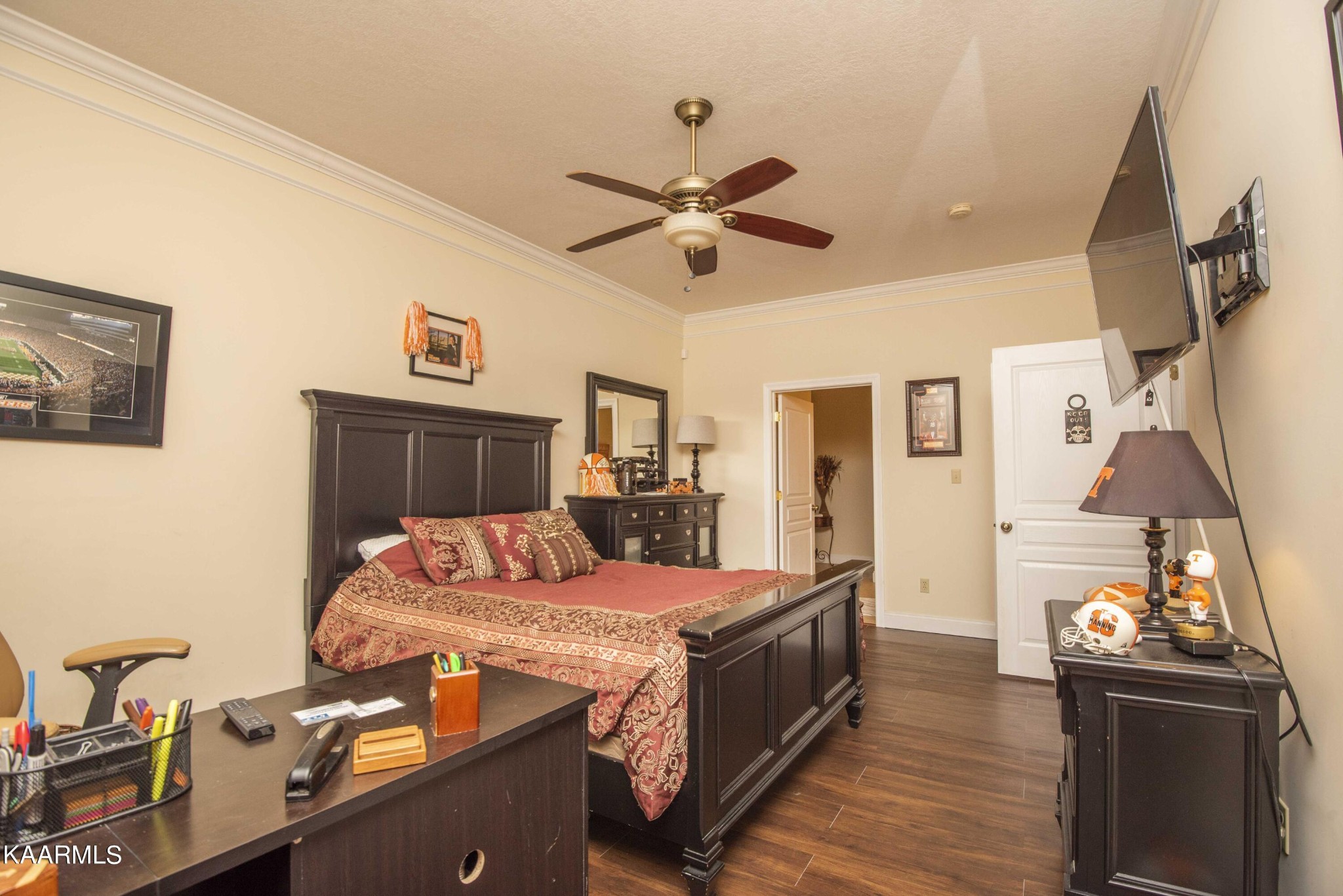 7412 Ridge Haven Court Corryton, TN 37721 - Photo 39 of 59 a bedroom with a bed and wooden floor