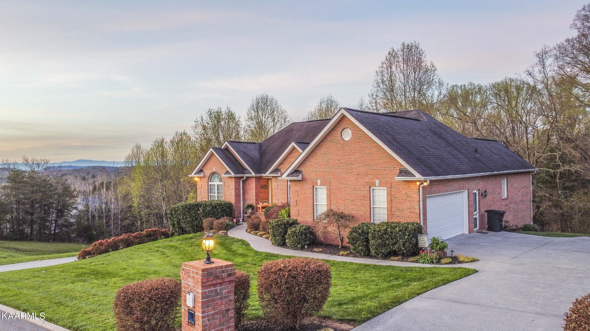 7412 Ridge Haven Court Corryton, TN 37721 - Photo 4 of 59 a front view of a house with a yard