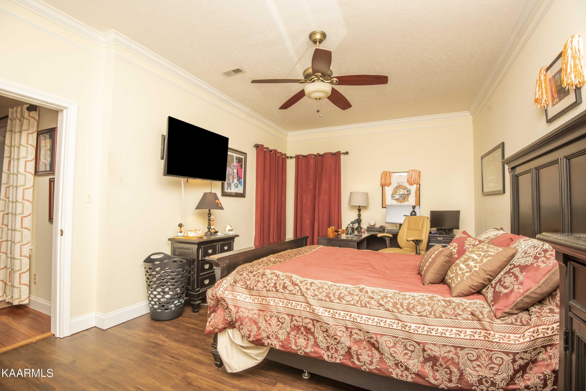 7412 Ridge Haven Court Corryton, TN 37721 - Photo 41 of 59 a bedroom with a bed and a flat screen tv