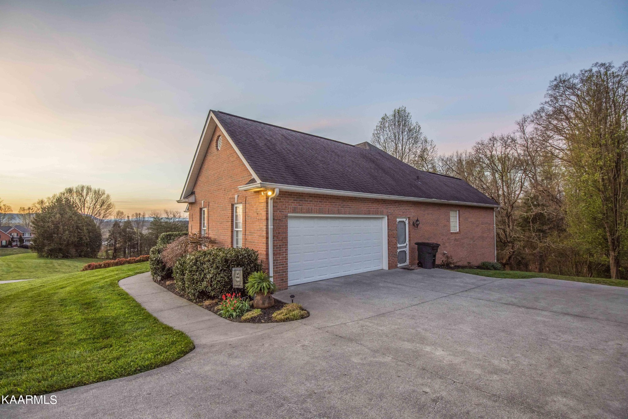 7412 Ridge Haven Court Corryton, TN 37721 - Photo 5 of 59 a view of a house with a yard and a large tree