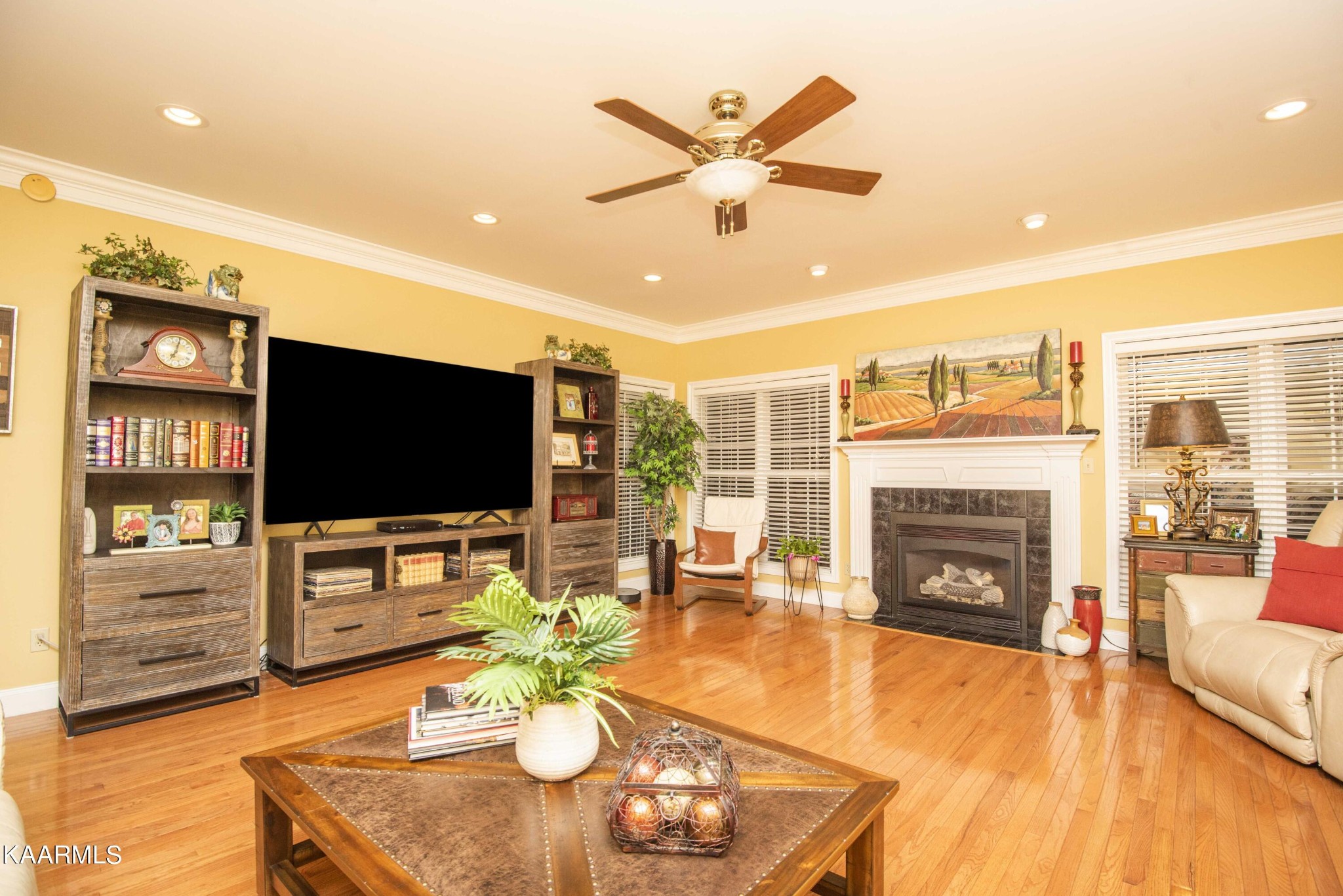 7412 Ridge Haven Court Corryton, TN 37721 - Photo 8 of 59 a living room with fireplace furniture and a flat screen tv