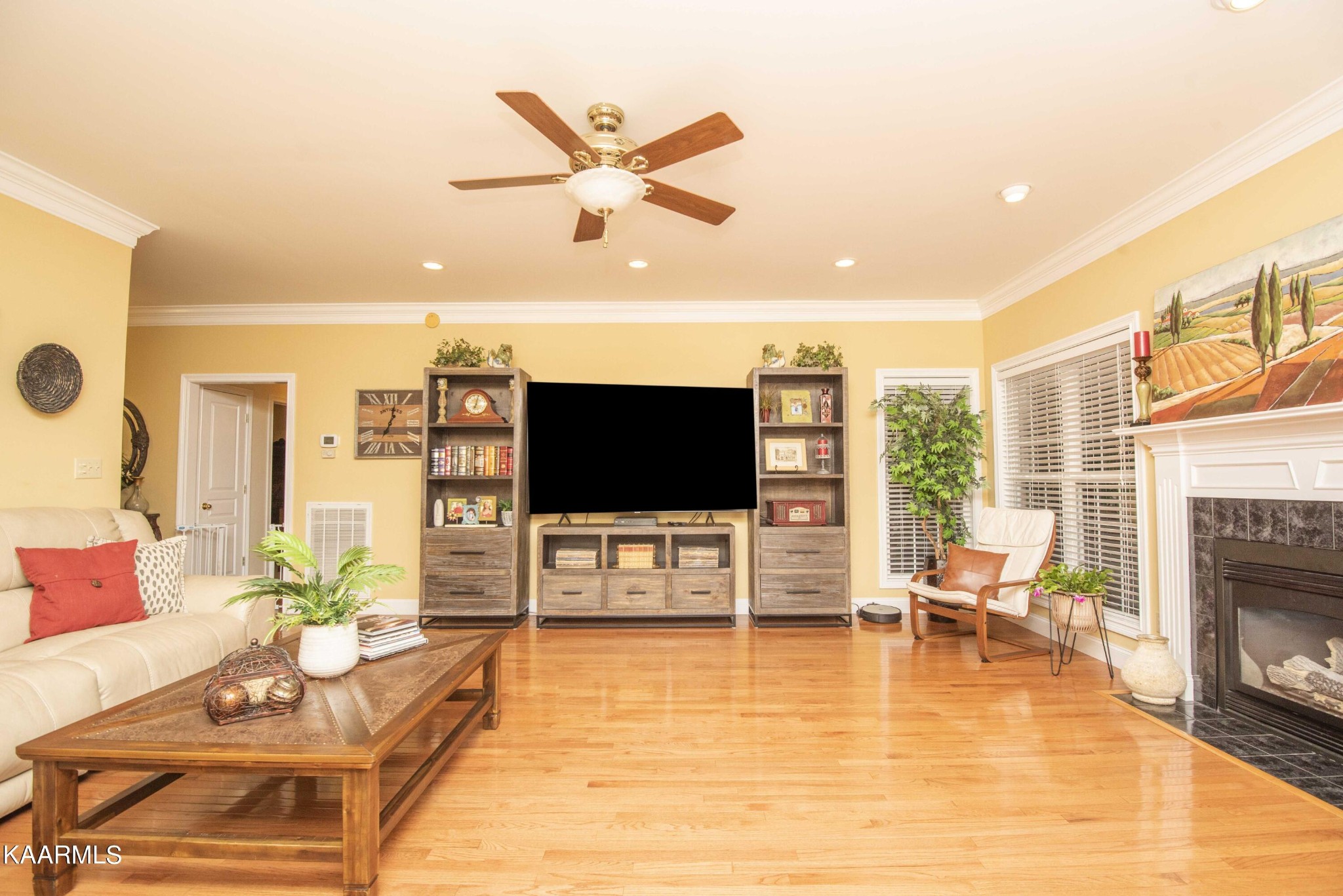 7412 Ridge Haven Court Corryton, TN 37721 - Photo 10 of 59 a living room with furniture and a flat screen tv