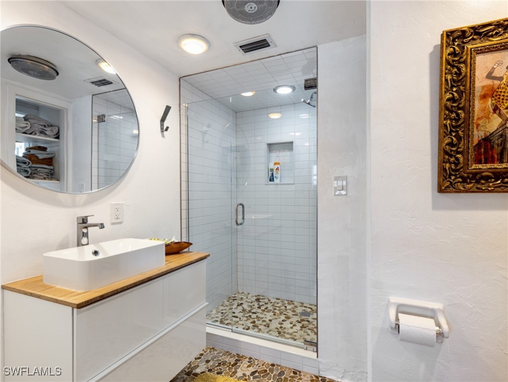 3666 Princeton Street Fort Myers, FL 33901 - Photo 23 of 31 a bathroom with a sink a toilet and shower