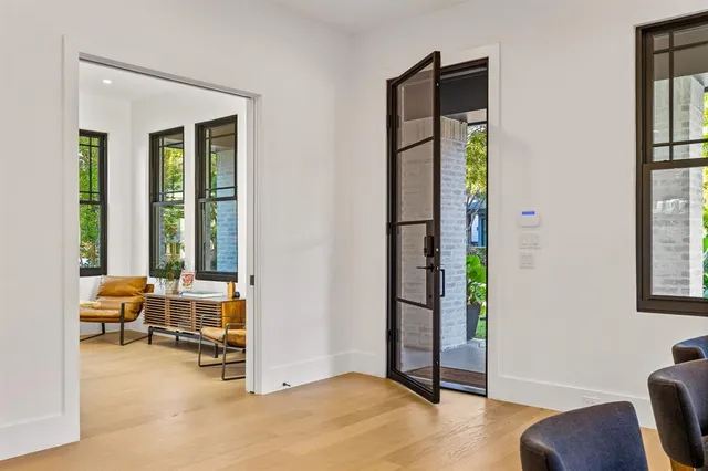 a view of workspace with furniture and window