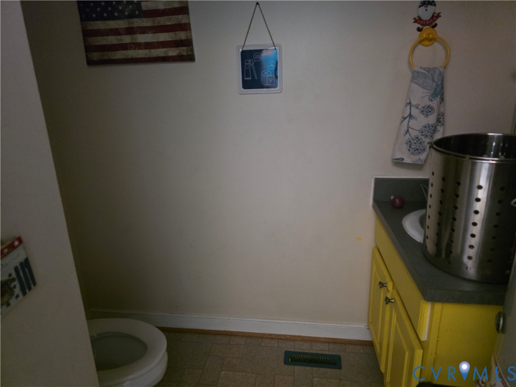 3161 Dorrell Road Aylett, VA 23009 - Photo 22 of 41 a bathroom with a toilet and a sink