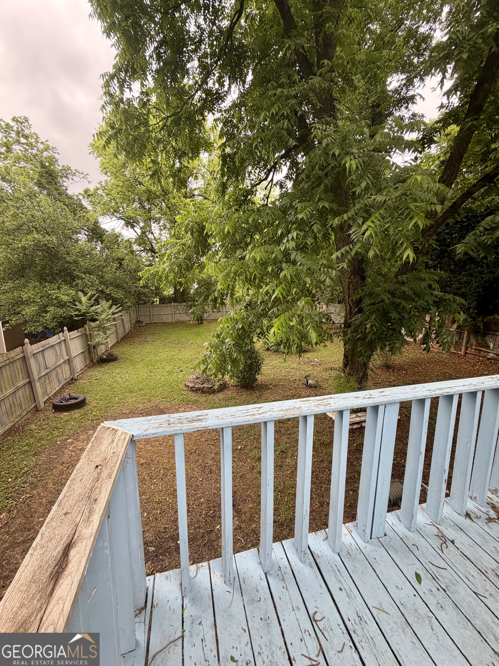 666 Woolfolk Street Macon, GA 31217 - Photo 60 of 60 a view of balcony with wooden floor and seating space
