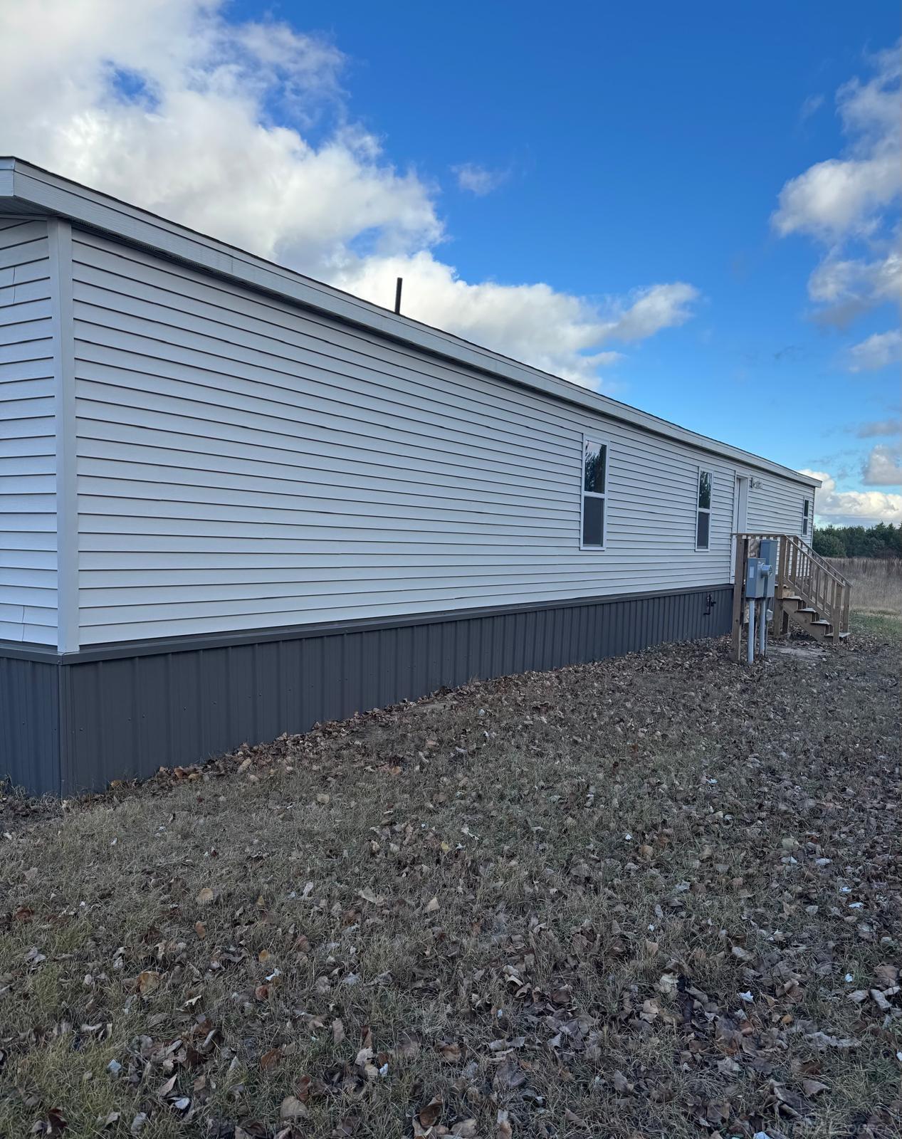 8177 Cedar River Road Mancelona, MI 49659 - Photo 2 of 14 50194910-ddd7cbc9-ddb8-480d-a147-6c280ed26f8b.JPG