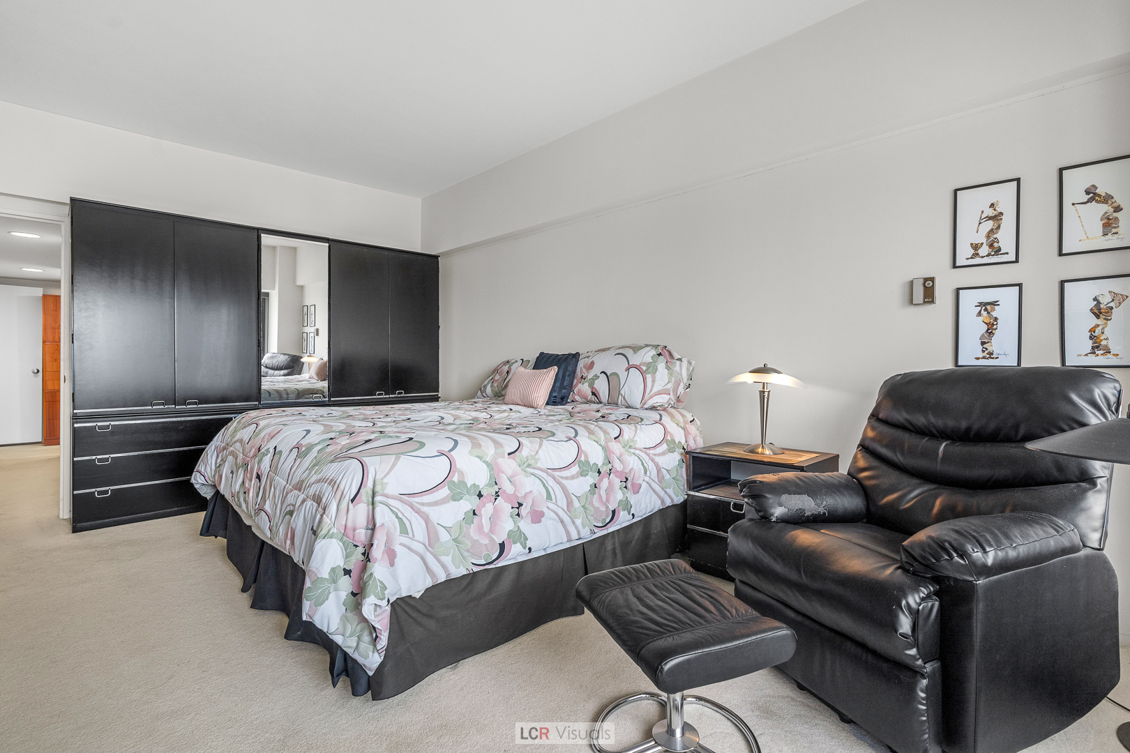 175 East Delaware Place, Unit 4816 Chicago, IL 60611 - Photo 14 of 30 a bedroom with a bed and dresser
