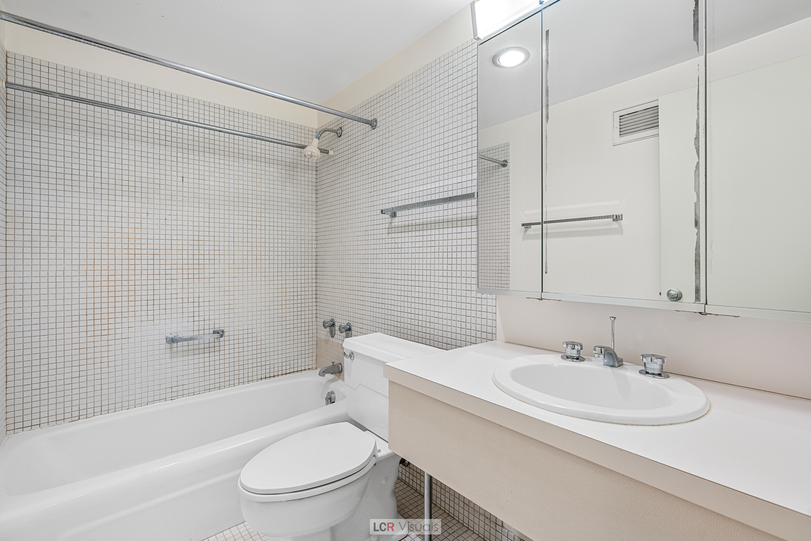 175 East Delaware Place, Unit 4816 Chicago, IL 60611 - Photo 15 of 30 a bathroom with a sink toilet and shower