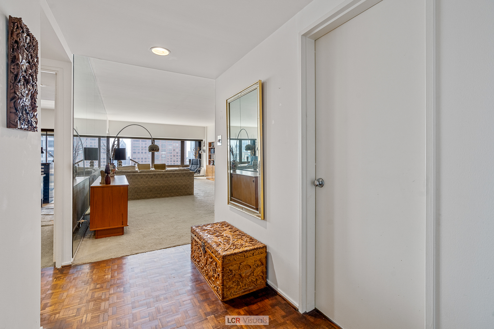 175 East Delaware Place, Unit 4816 Chicago, IL 60611 - Photo 2 of 30 a living room with furniture and a window