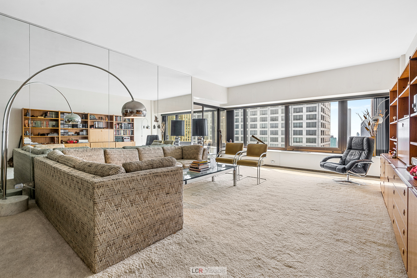 175 East Delaware Place, Unit 4816 Chicago, IL 60611 - Photo 7 of 30 a living room with furniture and a large window