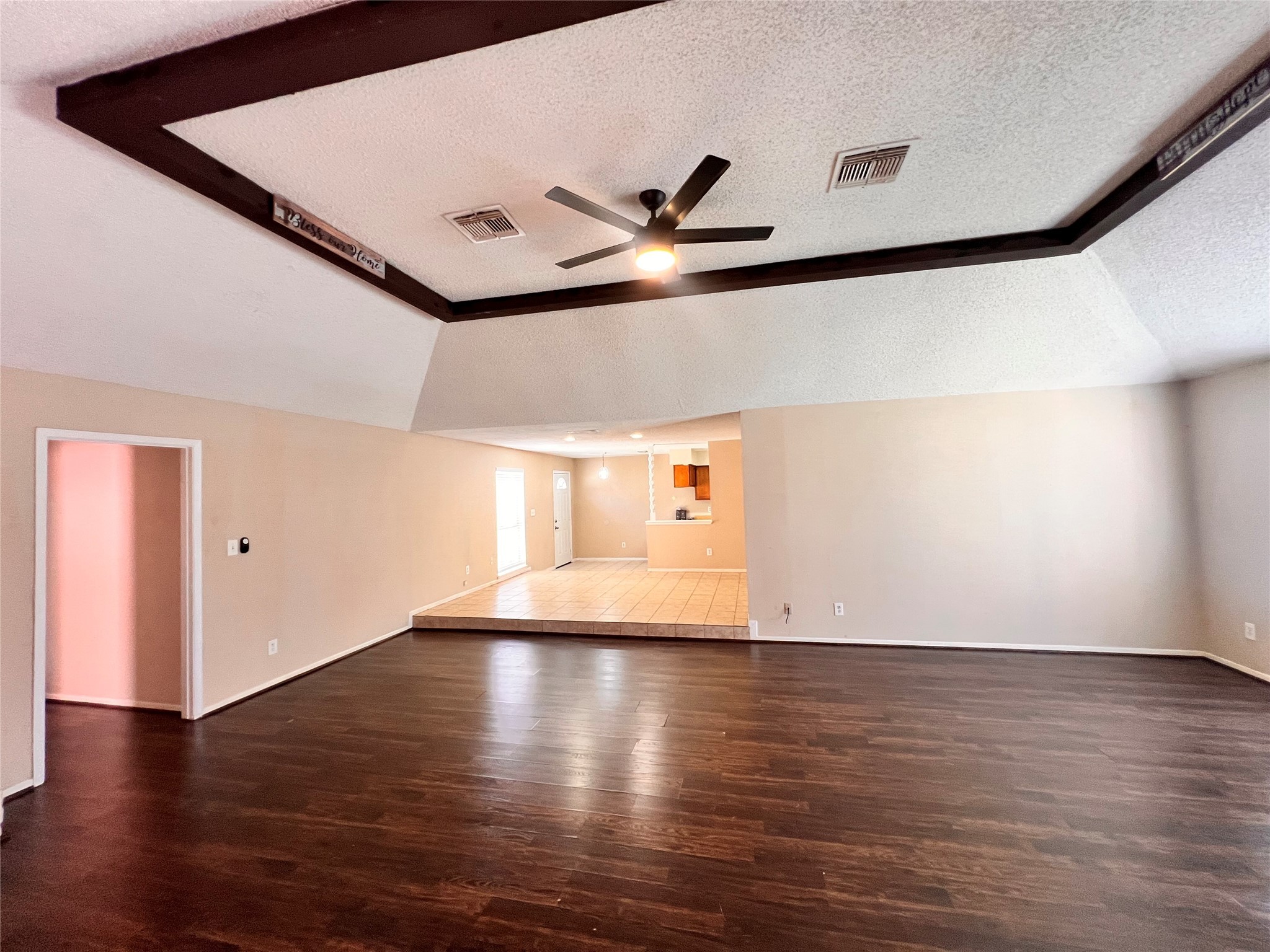 6331 Pouter Drive Houston, TX 77083 - Photo 7 of 28 a view of an empty room with wooden floor