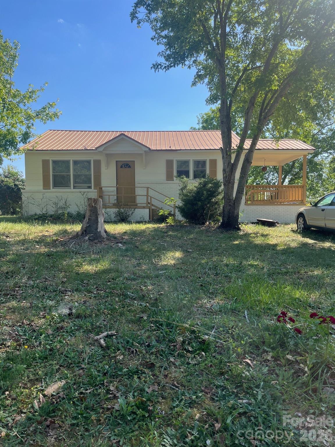 1612 Hawfield Road Charlotte, NC 28214 - Photo 2 of 2 a view of a house with a yard