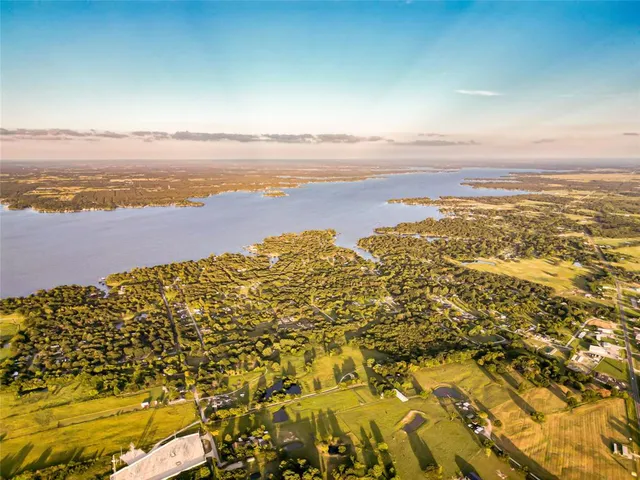 a view of a garden with a house