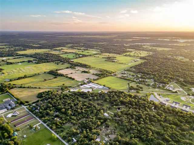 a view of a playground with basketball court