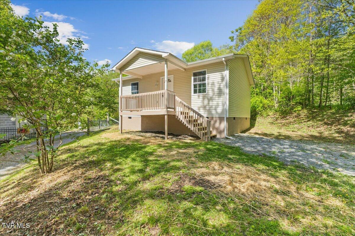 195 Willard Perkins Road Roan Mountain, TN 37687 - Photo 1 of 27 04-128A6296