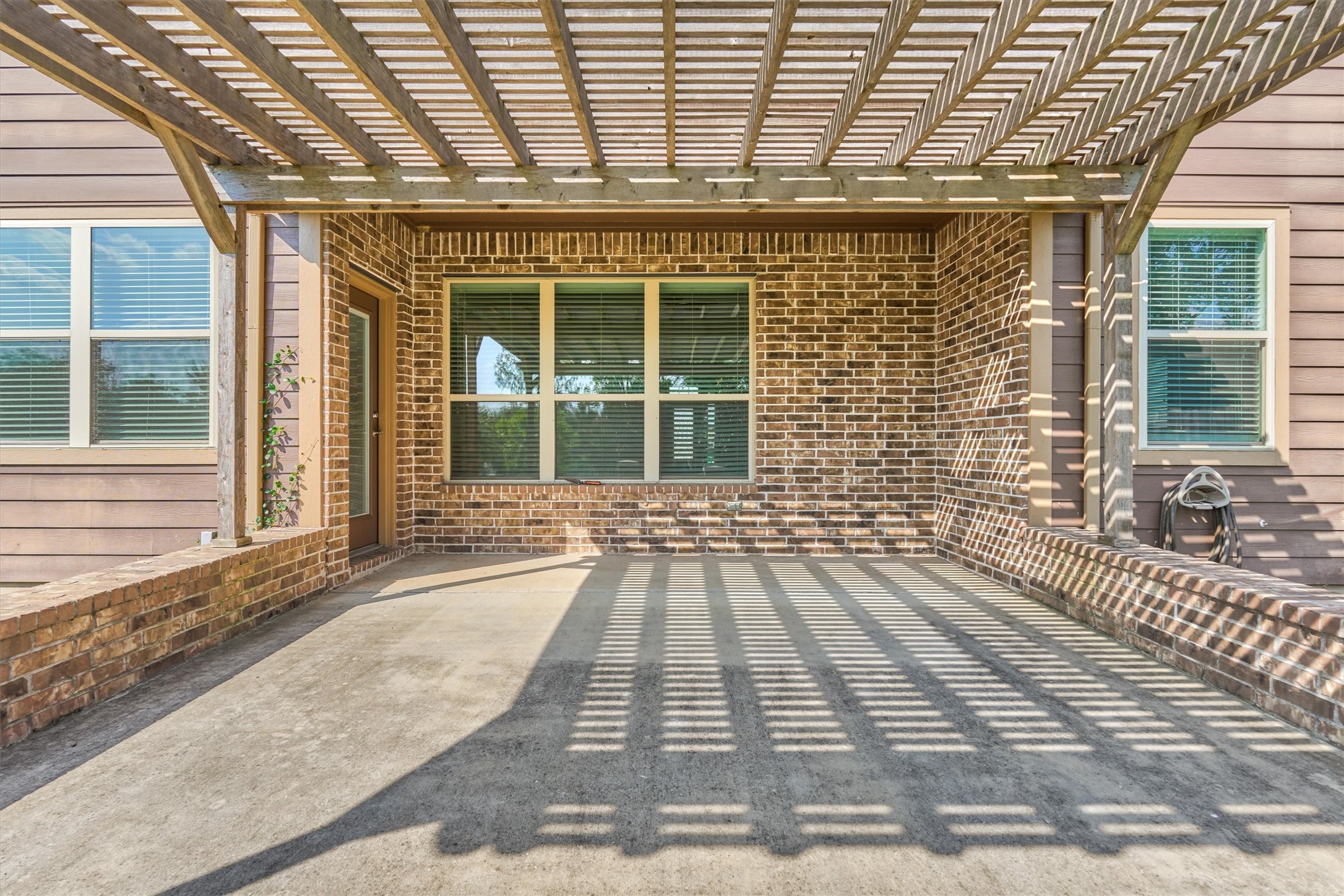 180 Racetrack Lane Montgomery, TX 77356 - Photo 37 of 46 Enjoy your back patio and pergola year round.