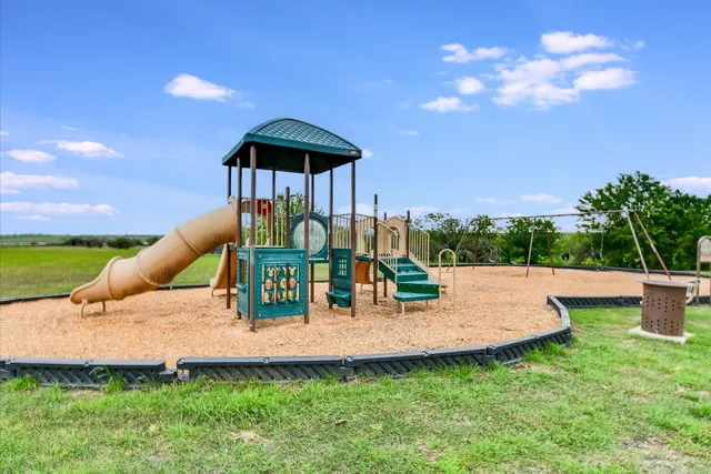 a view of garden with an outdoor space