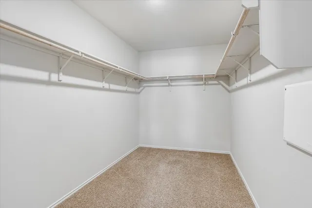 a view of an empty walk in closet
