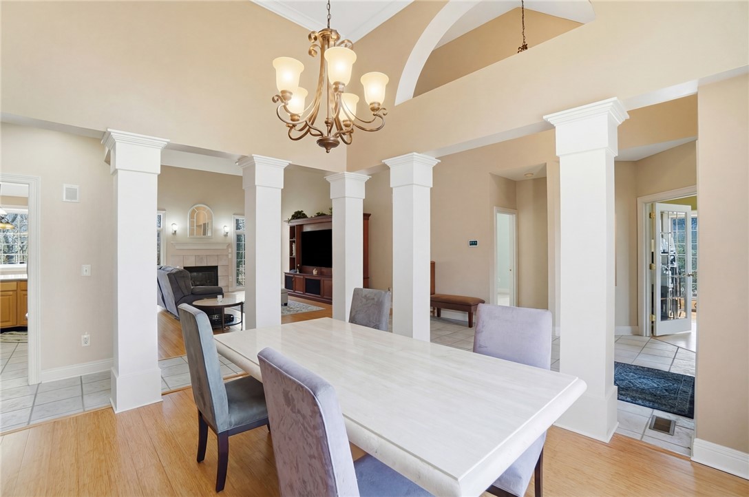 472 Timber Walk Court Springboro, OH 45066 - Photo 16 of 86 This spacious dining area features elegant columns and an open layout, ideal for gatherings.