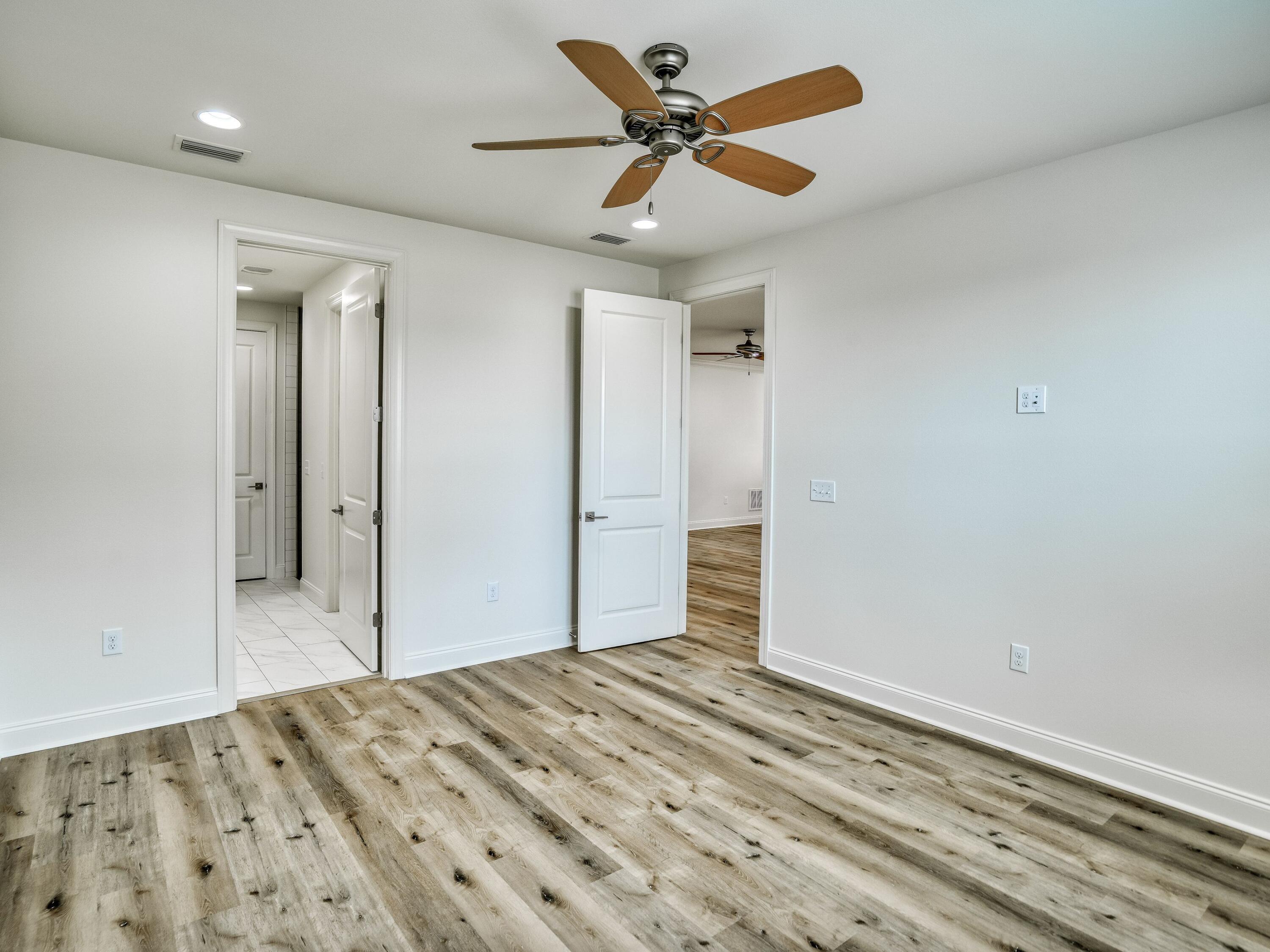 113 Conifer Court Watersound, FL 32461 - Photo 11 of 27 a view of a livingroom with a ceiling fan