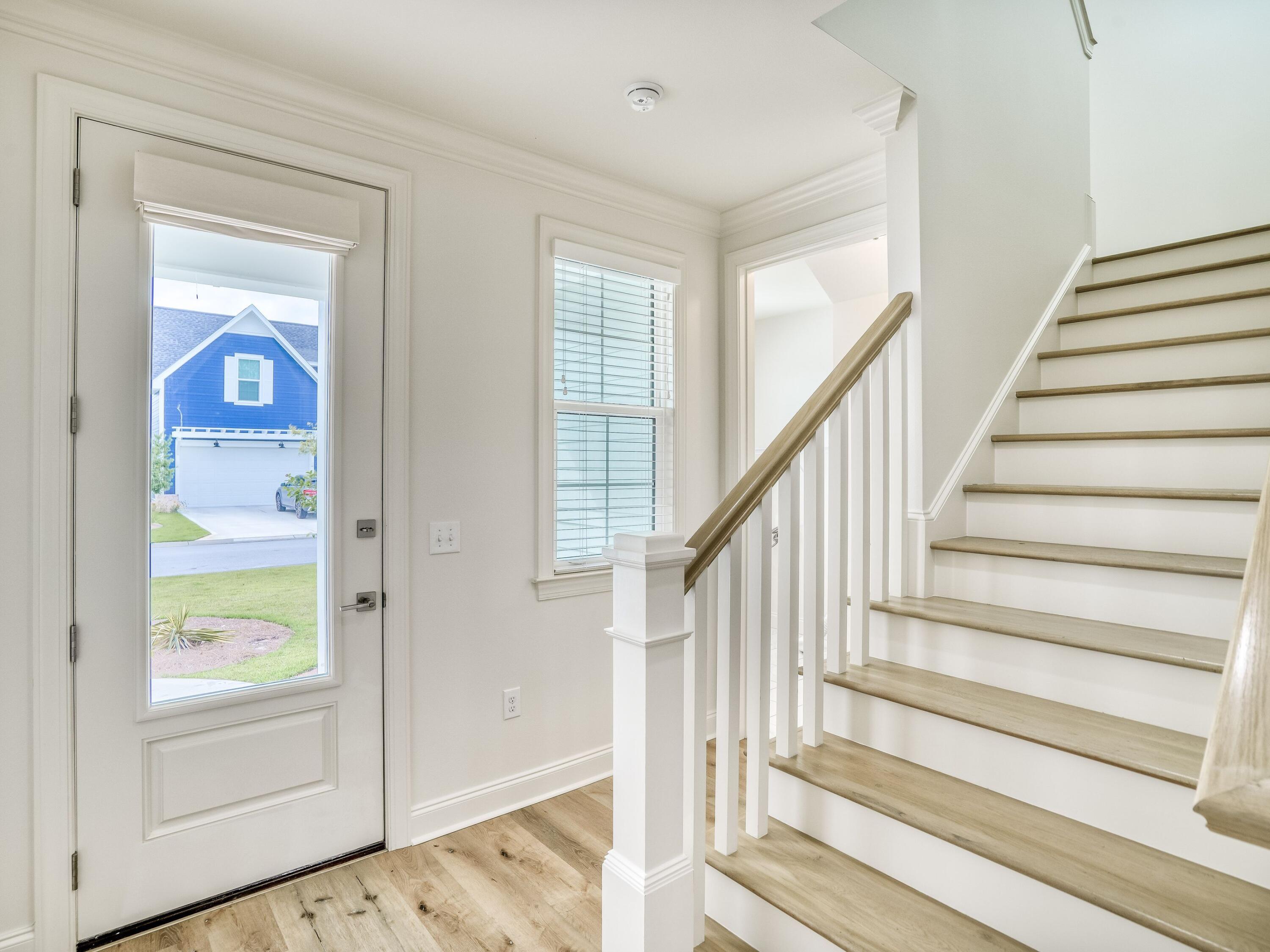 113 Conifer Court Watersound, FL 32461 - Photo 15 of 27 a view of an entryway with wooden floor