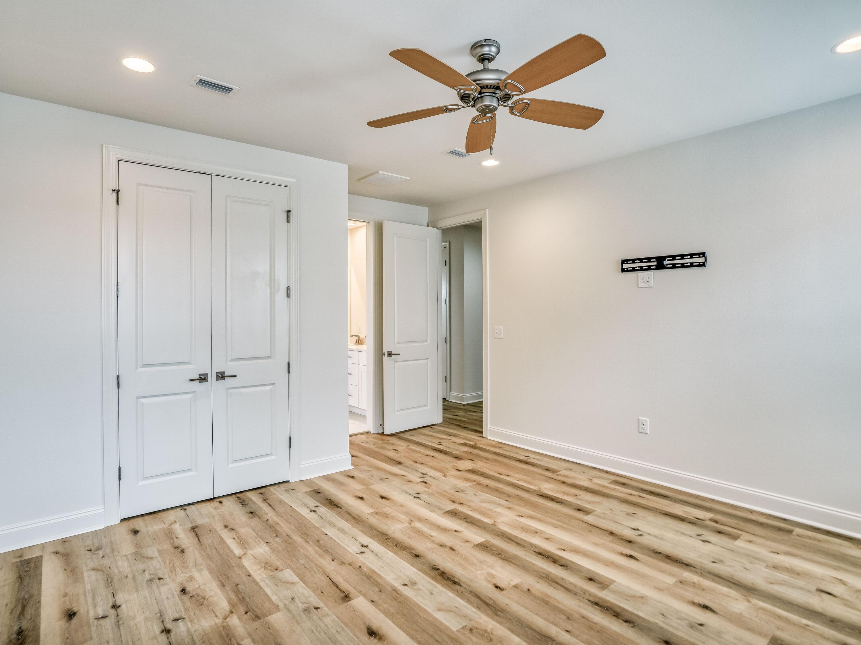 113 Conifer Court Watersound, FL 32461 - Photo 18 of 27 a view of a livingroom with a ceiling fan