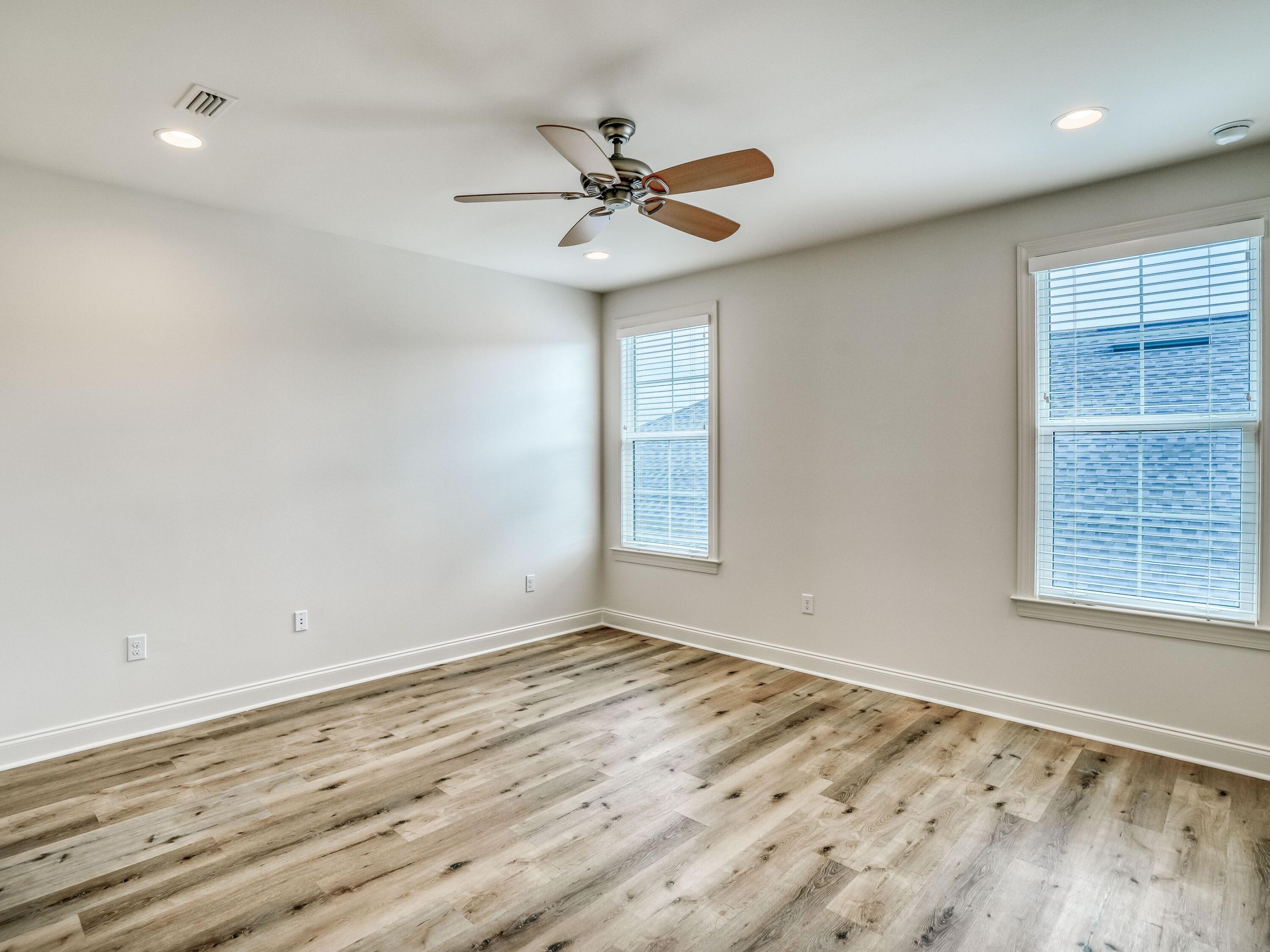 113 Conifer Court Watersound, FL 32461 - Photo 21 of 27 a view of an empty room with a window