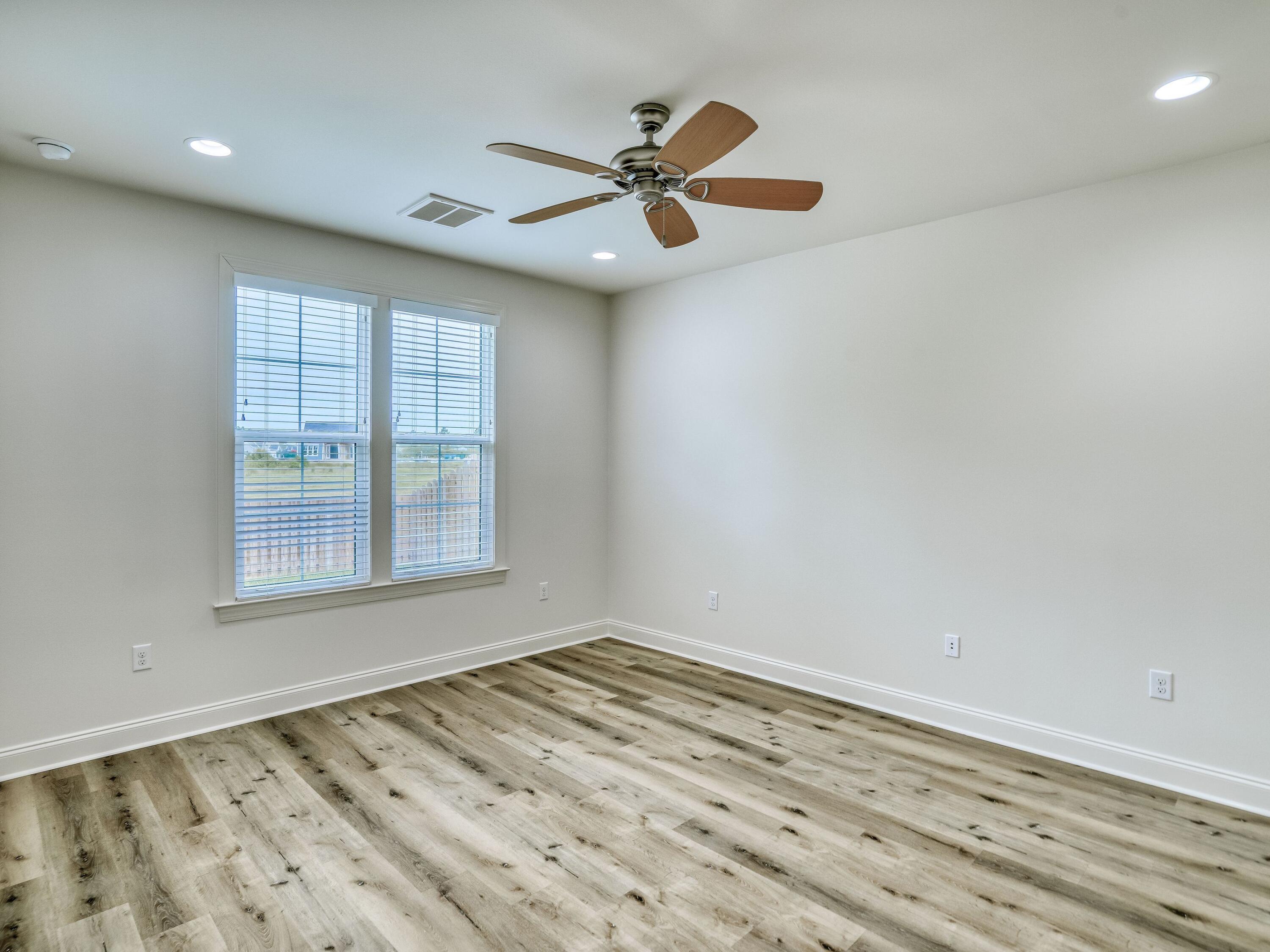 113 Conifer Court Watersound, FL 32461 - Photo 10 of 27 a view of an empty room with a window