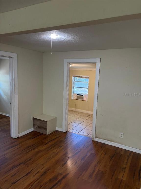 1623 Southeast 3rd Avenue Gainesville, FL 32641 - Photo 11 of 17 a view of empty room with wooden floor