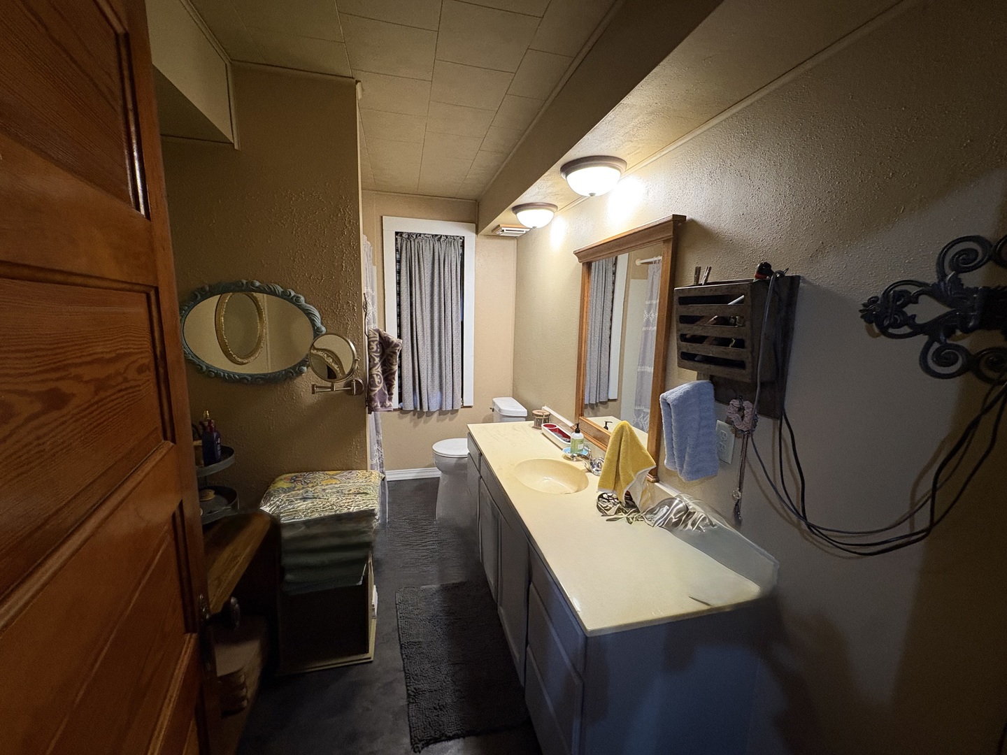 802 Paddock Avenue Ashton, IL 61006 - Photo 22 of 37 a bathroom with a sink mirror and tub