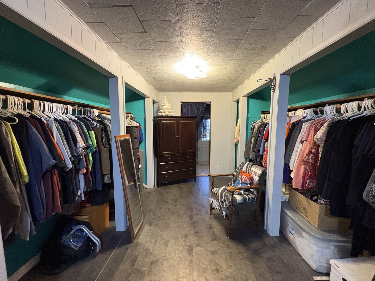 802 Paddock Avenue Ashton, IL 61006 - Photo 24 of 37 a view of walk in closet with clothes and shoes