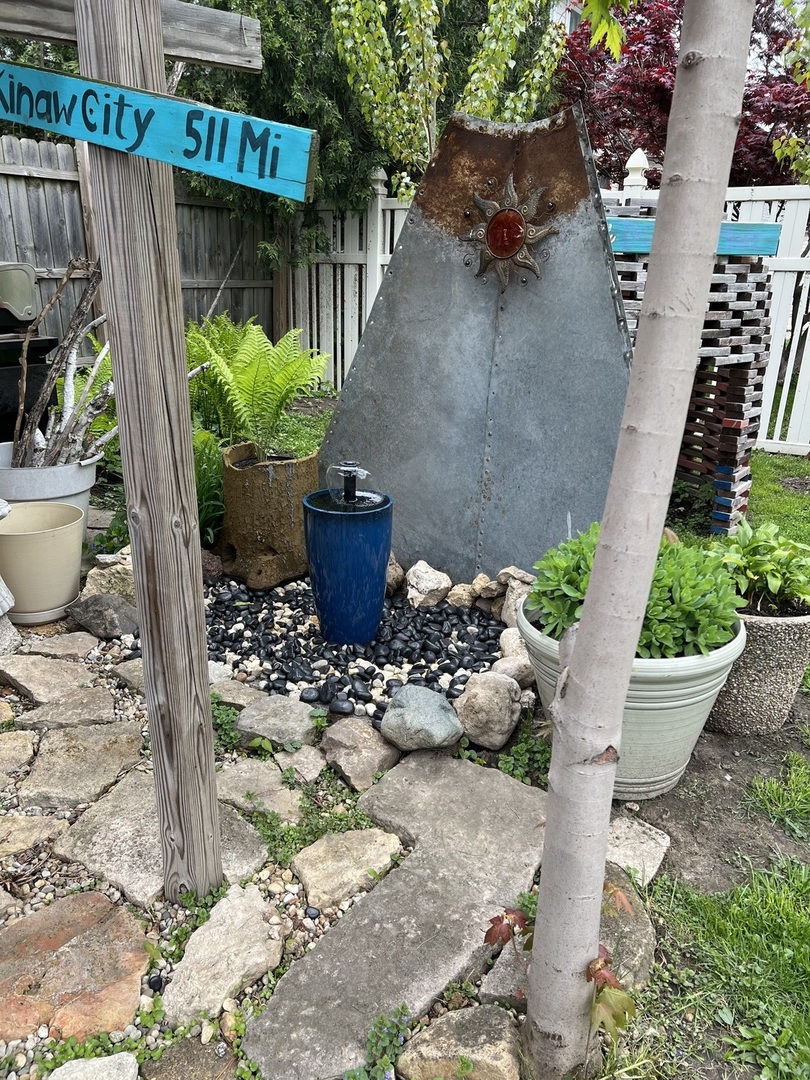 802 Paddock Avenue Ashton, IL 61006 - Photo 34 of 37 a view of a backyard with plants