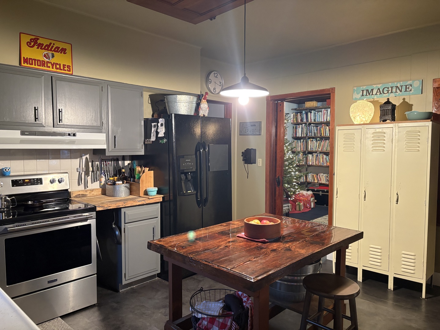 802 Paddock Avenue Ashton, IL 61006 - Photo 10 of 37 a kitchen with stainless steel appliances a dining table chairs and refrigerator