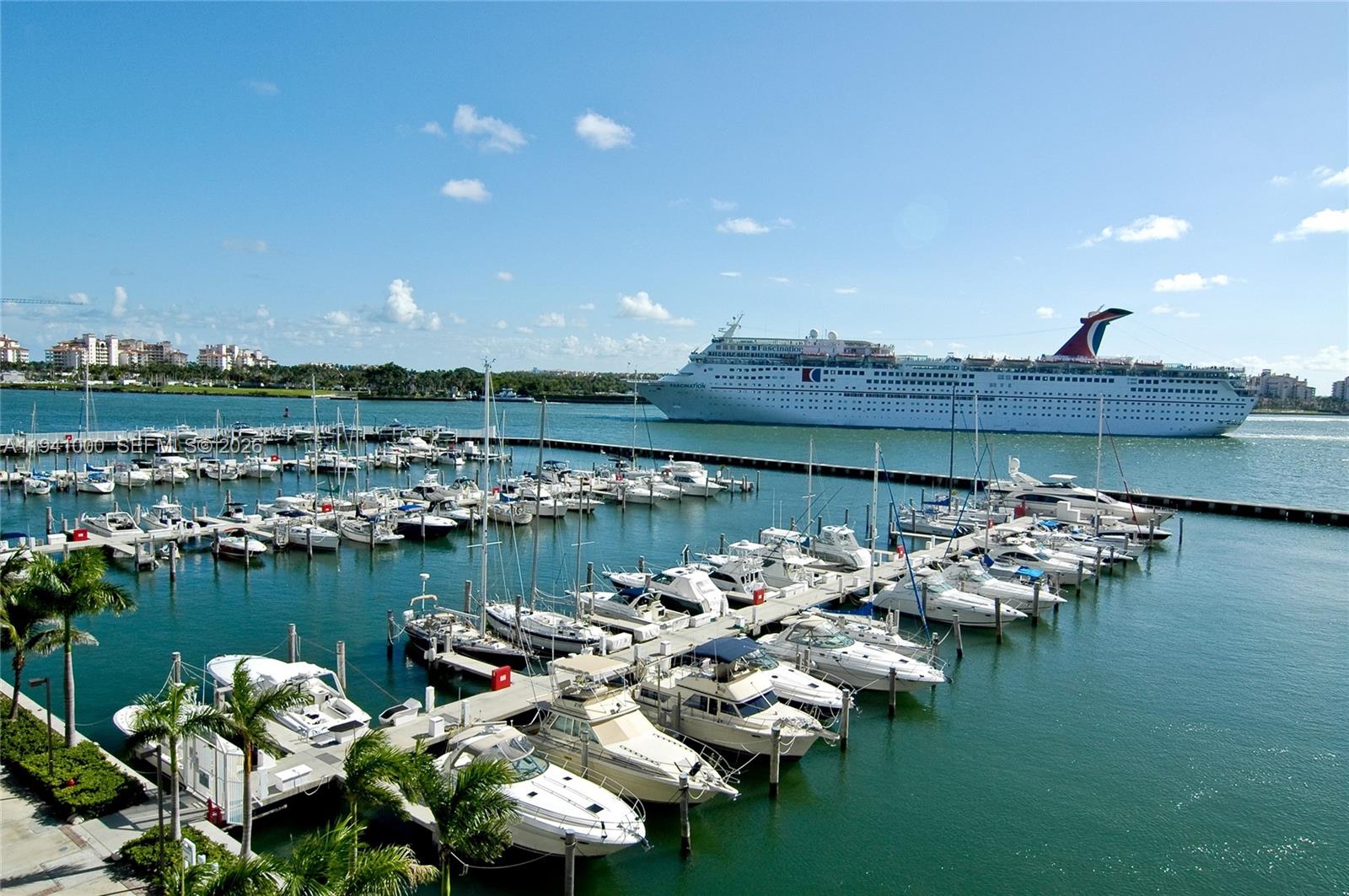 90 Alton Road, Unit 2803 Miami Beach, FL 33139 - Photo 17 of 21 a group of boats are docked in a lake
