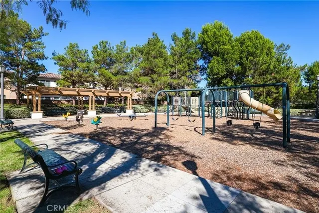 a view of a chairs and table in the patio