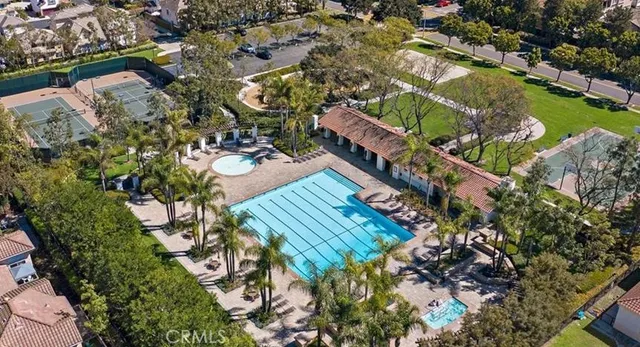 an aerial view of houses with outdoor space